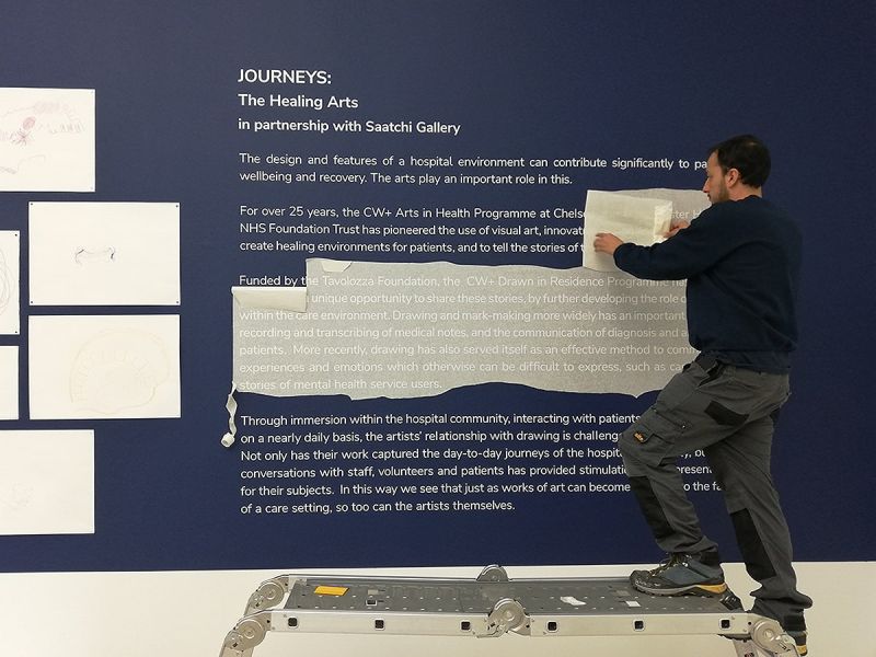 Exhibition description applied to wall - Saatchi Gallery