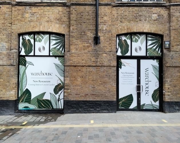 Large window stickers for restaurant opening in central London