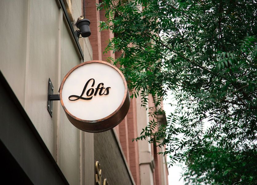 Projecting sign in copper, metal and acrylic